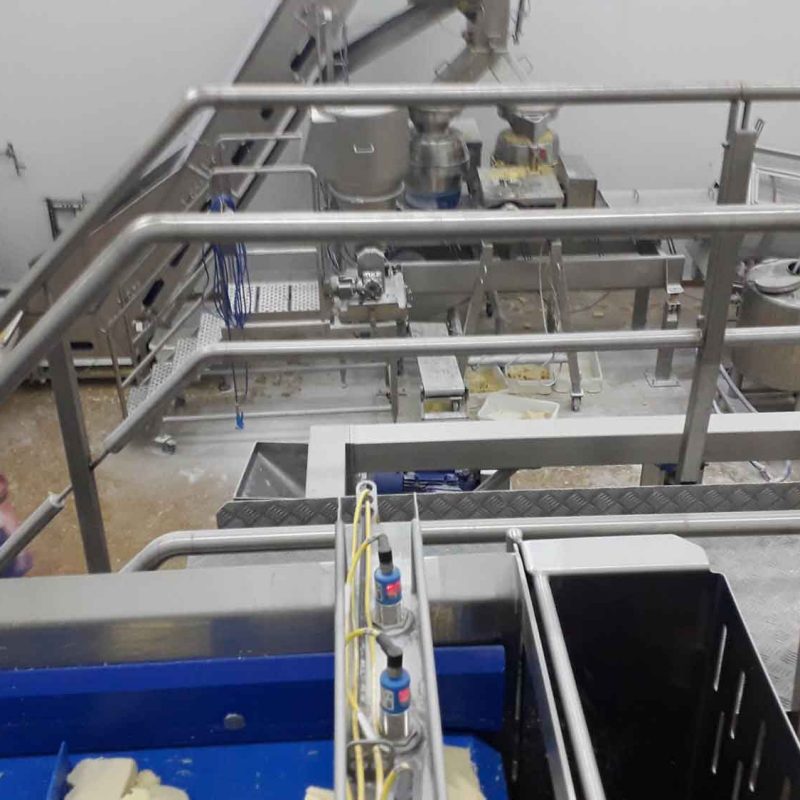 CHEESE-CUTTING-cheese-shread-line-food-indsurty-dairy-partners-site-work